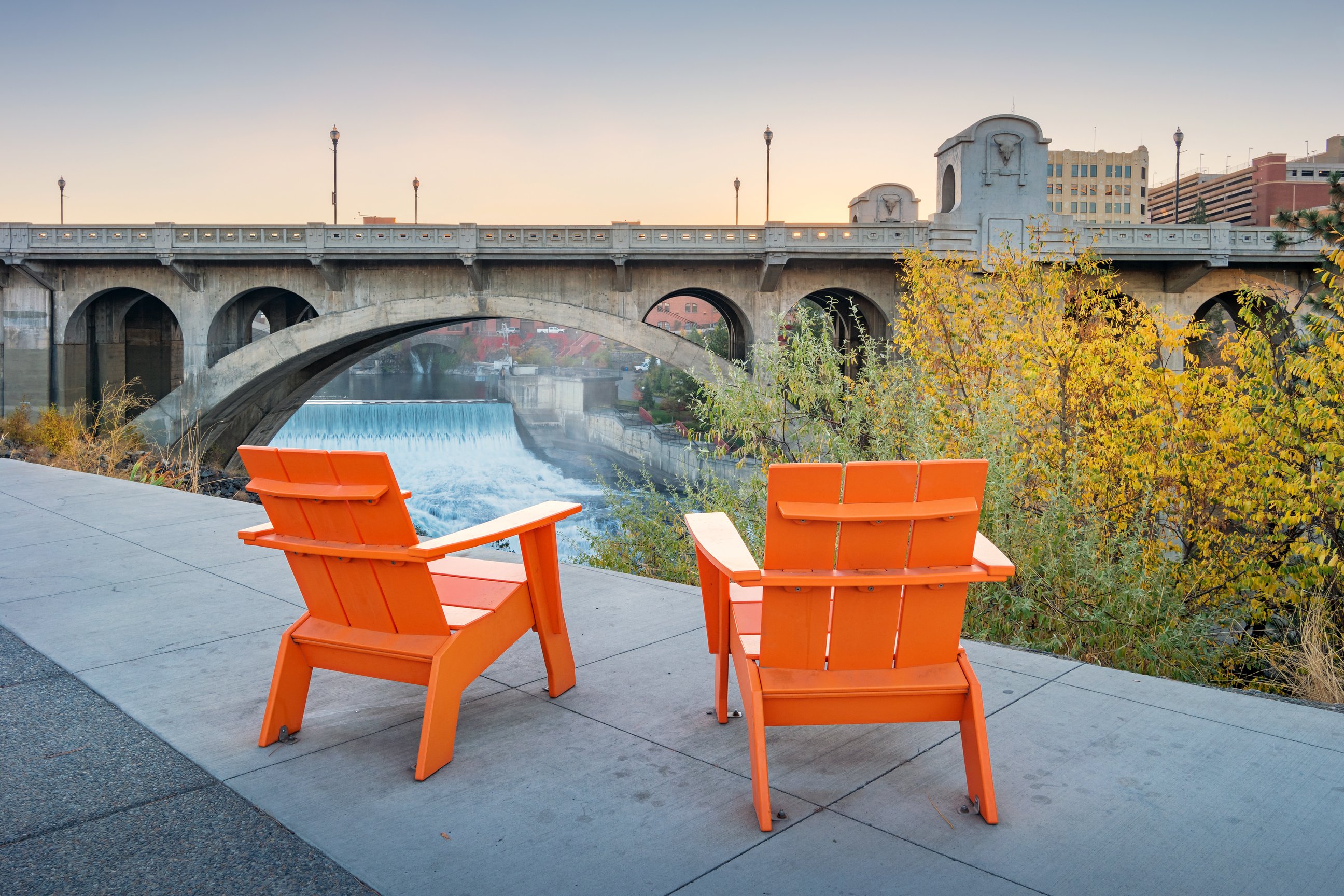 Chairs along the Spokane River promenade in downtown Spokane Washington